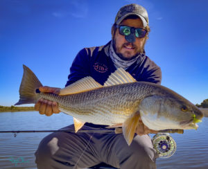 Captain Nick Angelo prepares to release a Withlacoochee Bay redfish
